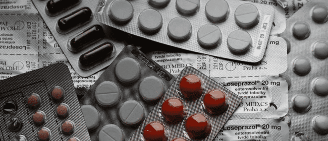 A pile of blister packs of different medications | Long Term Disability Claims
