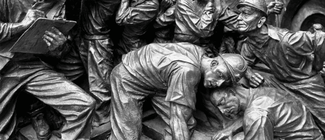 Bill 148 | Photo depicting miners of a bygone era with the caption "We;ve come a long way, baby", below.