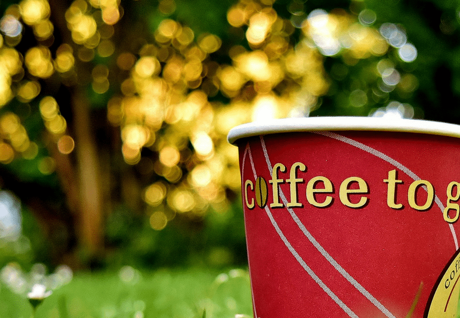 Changing Employment Terms | Red Coffee cup in the grass