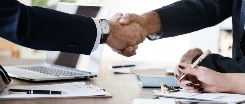 Successor Employers | A handshake Between Two men after a business deal