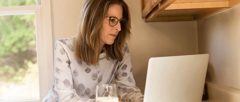 Work Life Balance | Woman working at her kitchen table